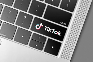 Tik Tok social network computer key, a Technology Photo by BOOCYS