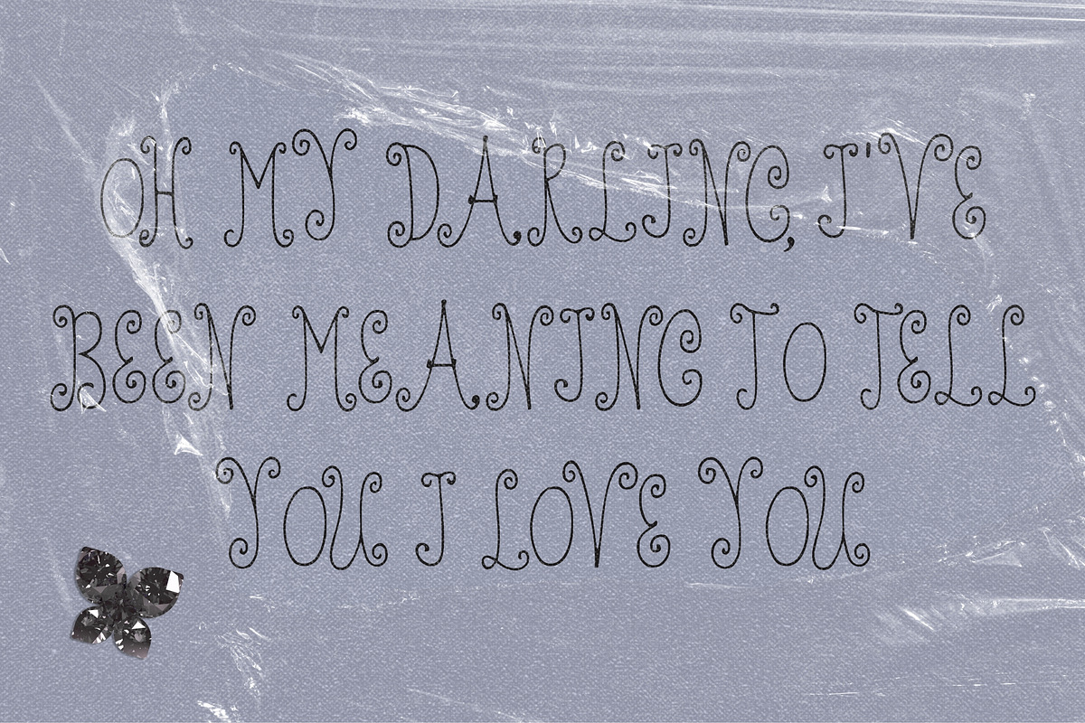 Spin Cycle Spiral Display Font, a Handwritten Font by The October Creative (Photo 6 of 8)