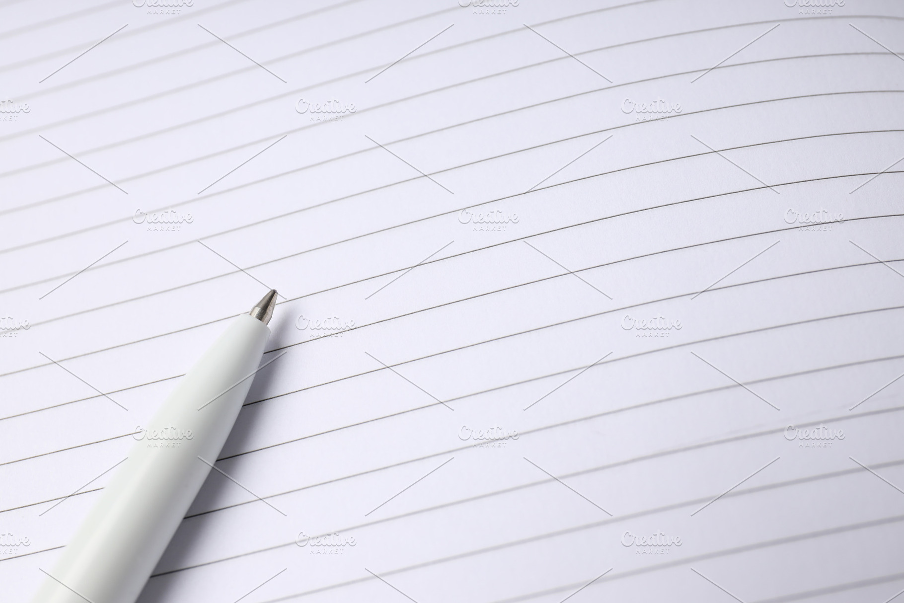 Blank notebook with pen on whole background, a Business Photo by AtlasStudio PRO
