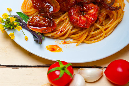 Italian seafood spaghetti pasta on red tomato sauce, a Food & Drink Photo by keko64