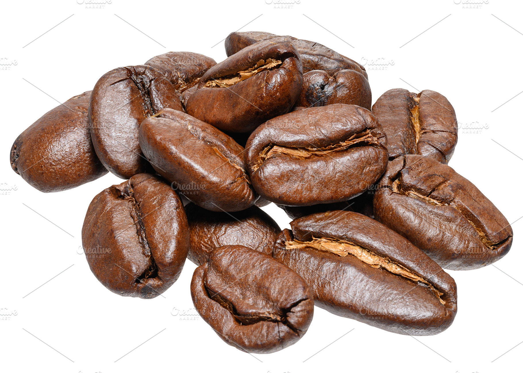 A handful of roasted coffee beans, shot close-up on an isolated, a Food & Drink Photo by ndanko