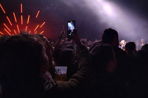 Live band on stage with radial light beams, a Sports & Recreation Photo by DanFLCreativo