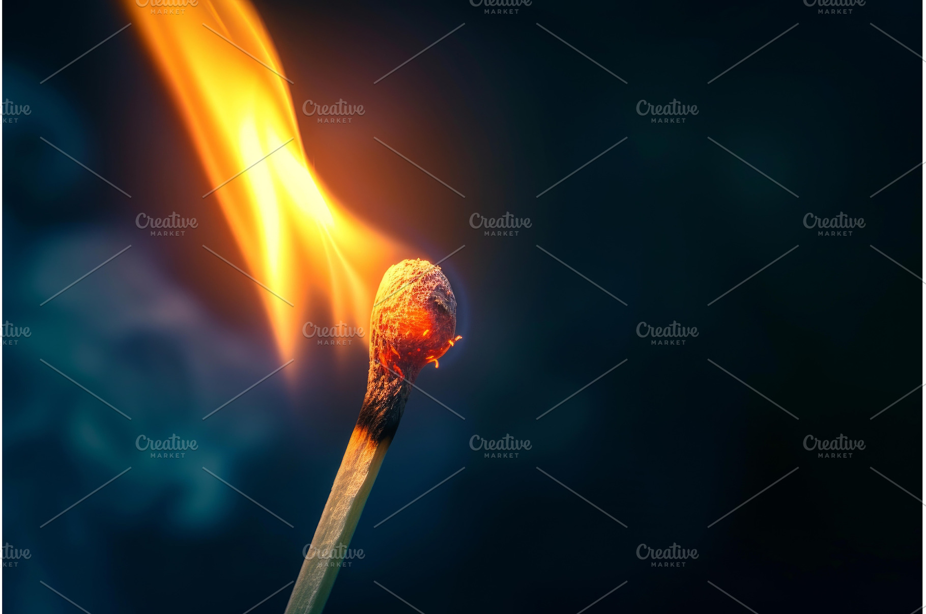 Ignited matchstick on a dark, an Abstract Photo by Ylivdesign
