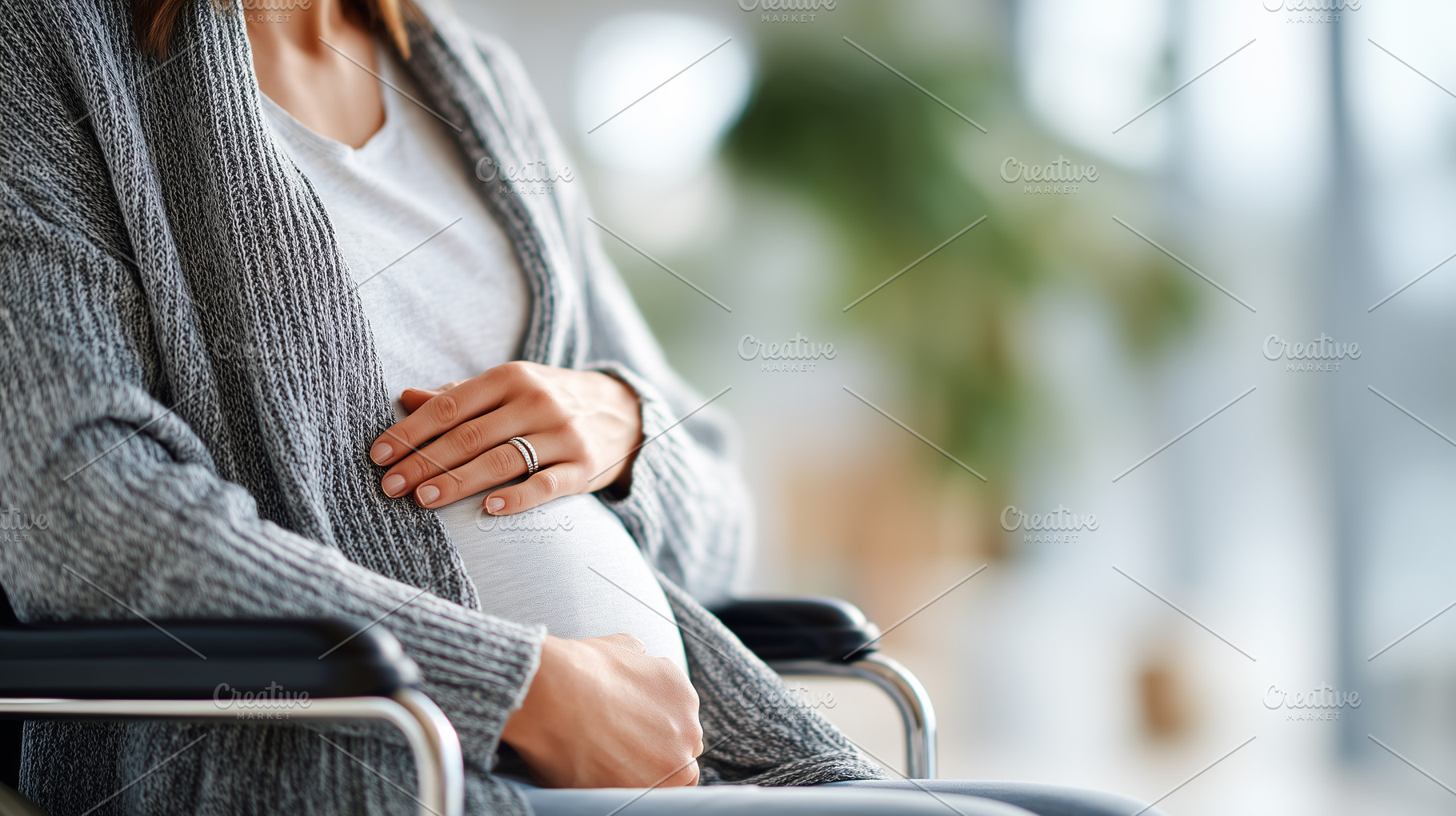 Pregnant woman sitting in wheelchair, a Person Photo by MistyDay