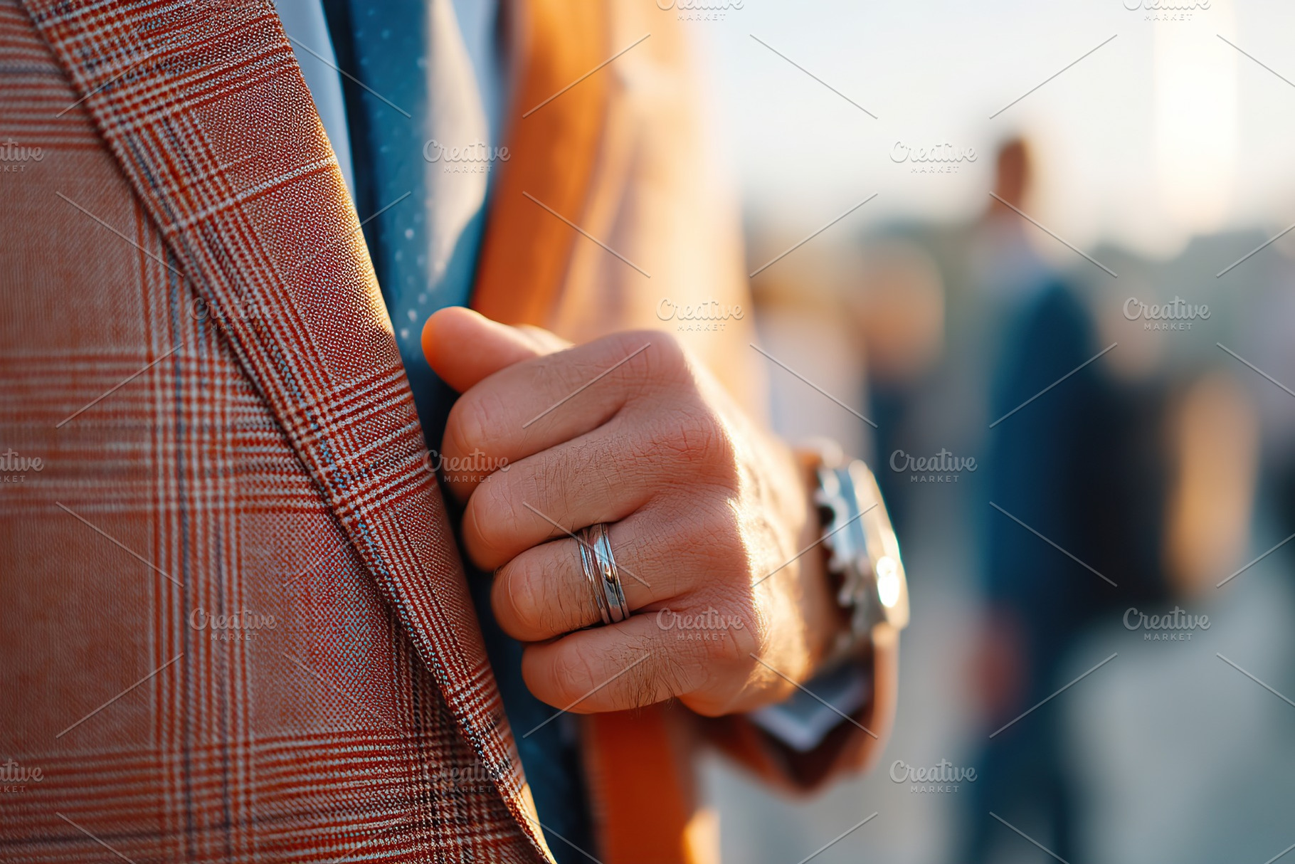 Stylish man adjusting his blazer while attending an outdoor event in the evenin, a Beauty & Fashion Photo by AlyaAnd