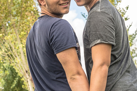 Gay couple featuring adult, background, and casual