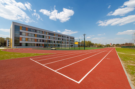 Artificial turf running track