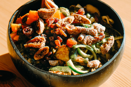 salad served on a coconut bowl, a Photo by Nito