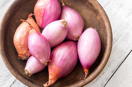 Bowl of shallots, a Food & Drink Photo by Alexander Prokopenko