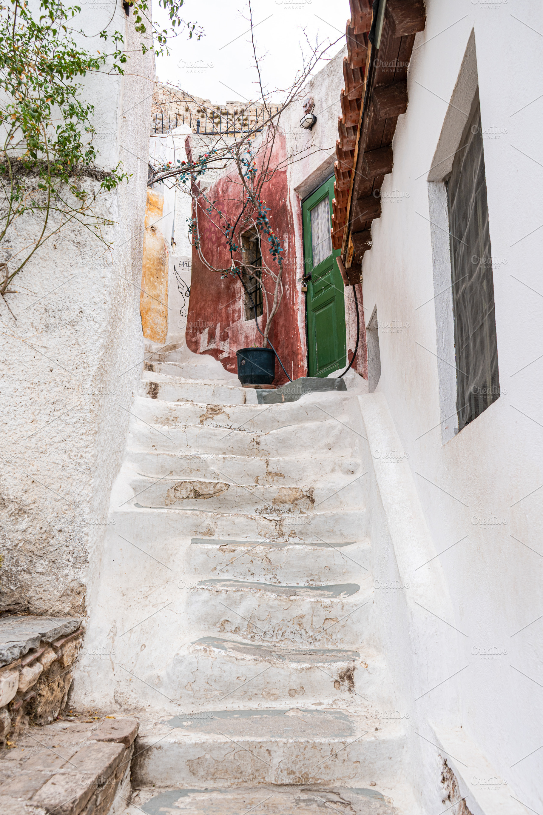 Narrow streets of Anafiotika area in ancient Athens, an Architecture Photo by Anna Bogush