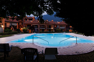Outdoor pool in a modern apartment complex, an Architecture Photo by Bepslabor