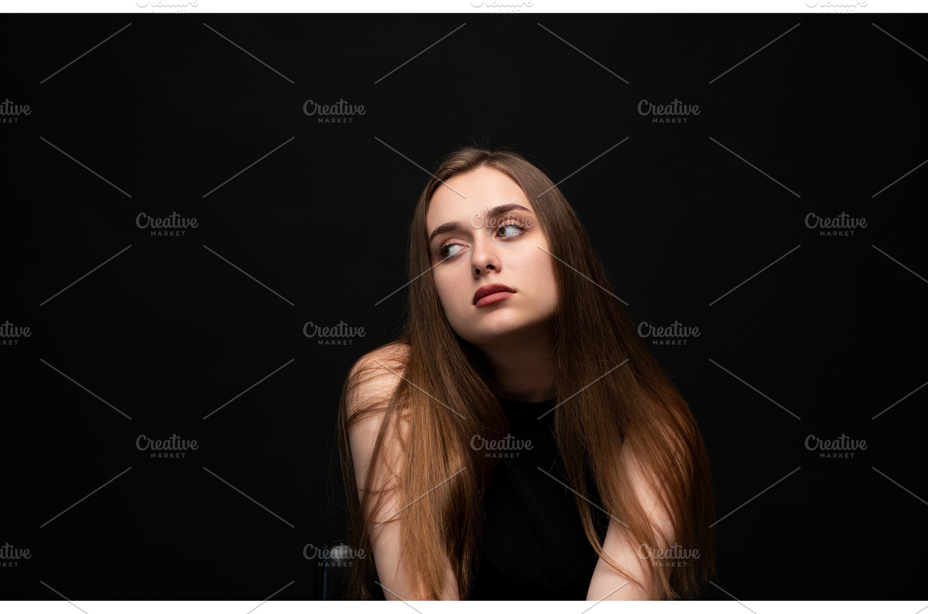 Young woman with long brown hair, a Person Photo by volodymyrshtun13795