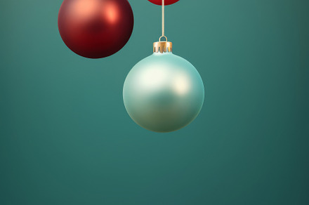 Christmas red and green matte ornaments on teal green background, a Photo by Dvoevnore photos