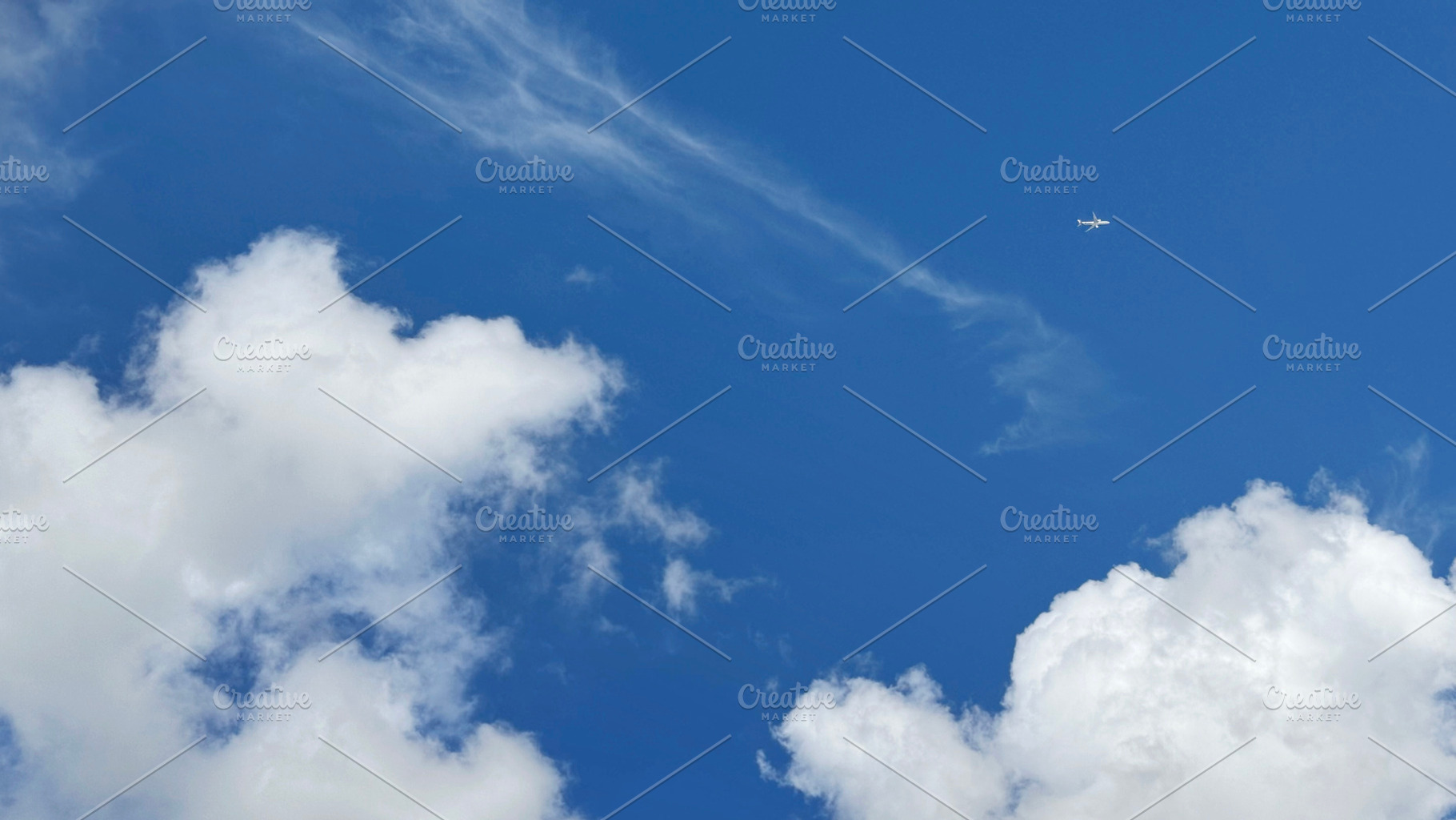 Airplane on blue sky and cloud, a Nature Photo by ArtBackground