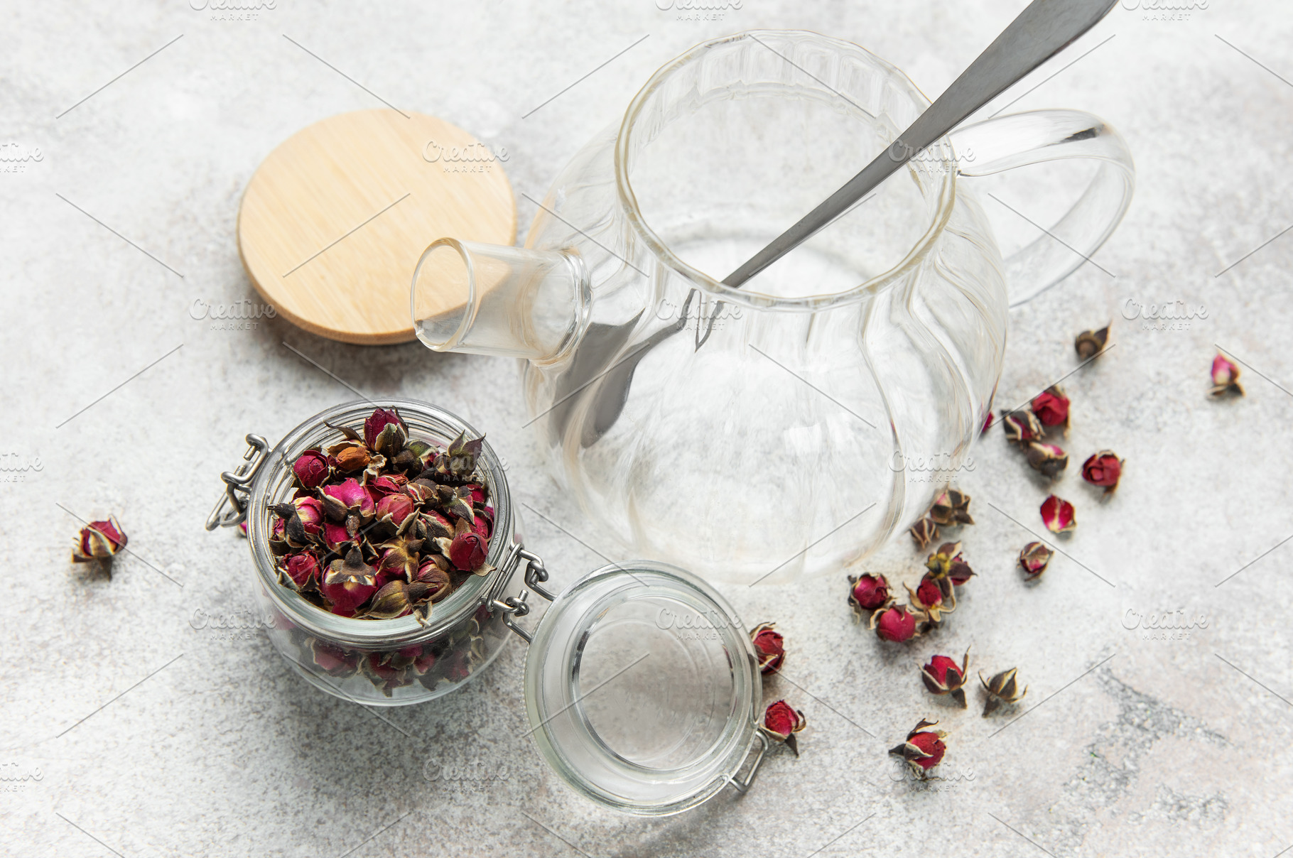 Glass teapot with dried rose buds for herbal tea, a Food & Drink Photo by Olena Rudo