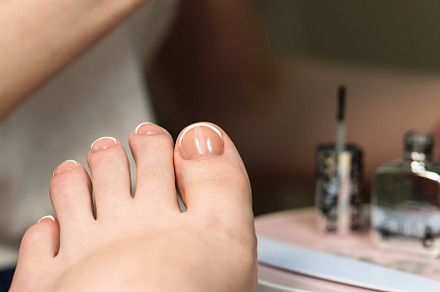 Pedicure gel polishing containing pedicure, nail, and spa, a Beauty & Fashion Photo by Elena Vagengeim