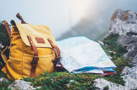 Yellow backpack and map