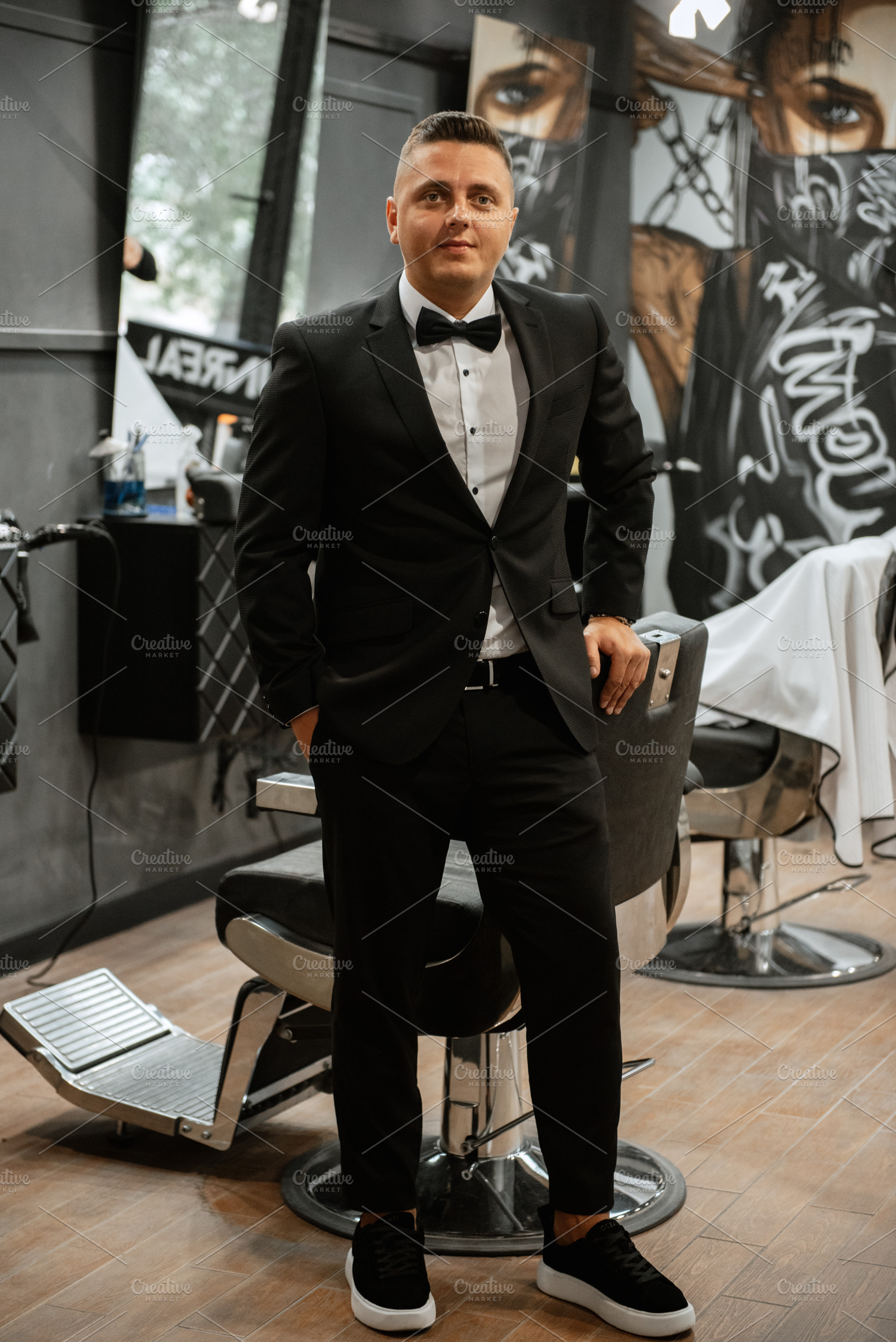 bearded man cutting his beard in the barbershop, a Person Photo by Weddings, People, Travel