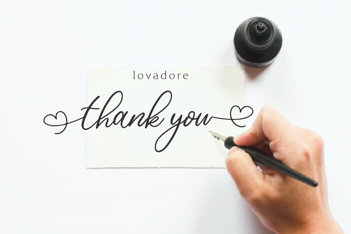 Lovadore, a Script Font by AMINMARIO (Photo 7 of 7)