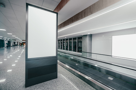 Travelator and a blank poster mockup, a Business Photo by SkyNext