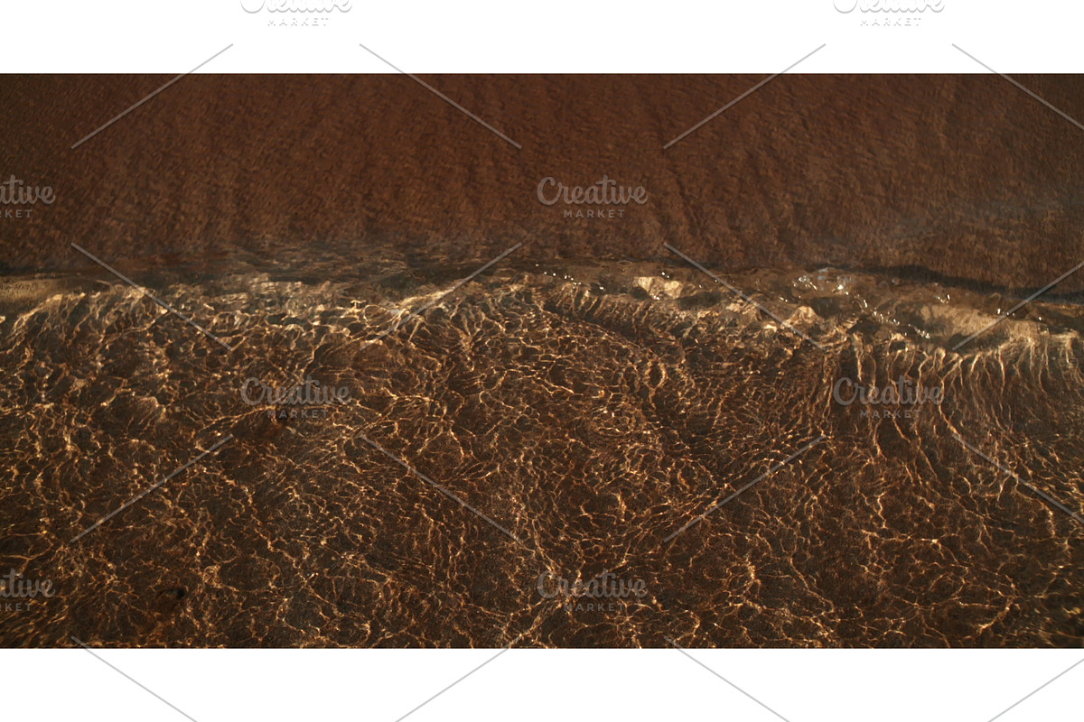 Clear Sea Water Waves Wash Sandy, a Graphic by Our Amazing World (Photo 1 of 2)