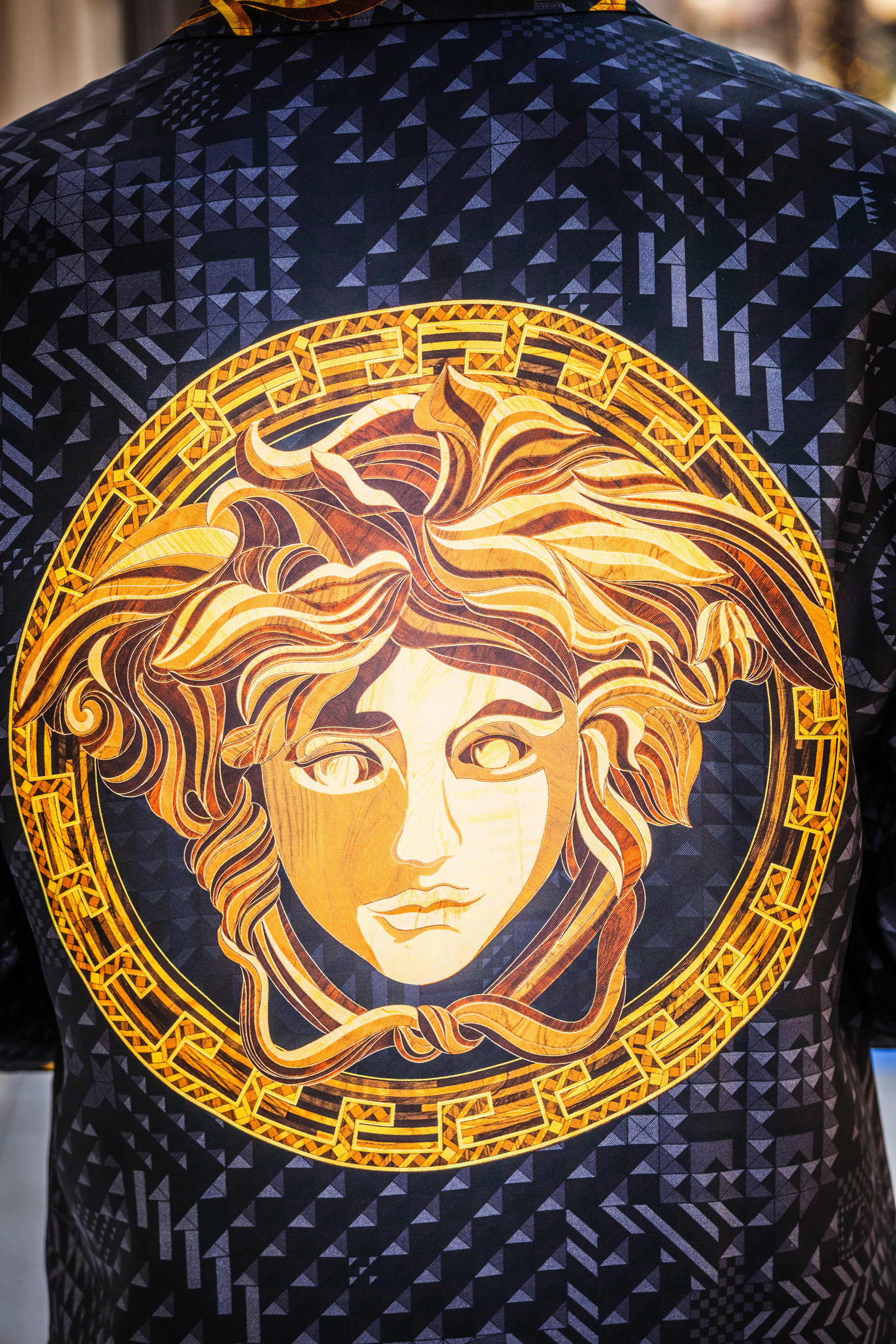 Versace logo as Medusa close-up, a Photo by Dolce Vita