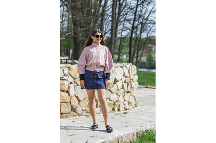 Young woman in pink jacket and denim, a Person Photo by serkum