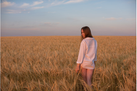 Woman in White Shirt at Sunset in, a Person Photo by Jan Jack Russo Media