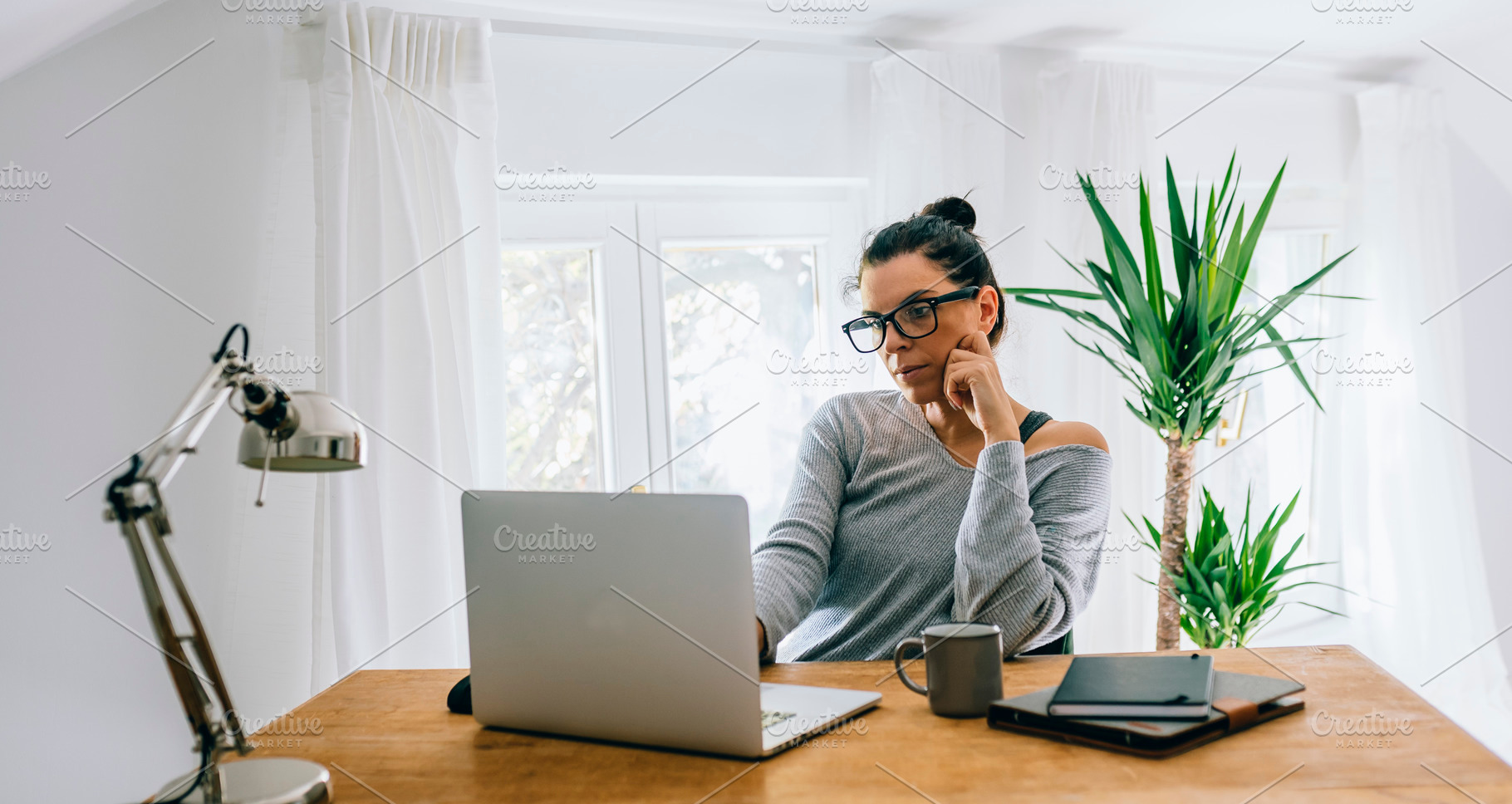 Middle aged woman working remote, a Person Photo by hitdelight