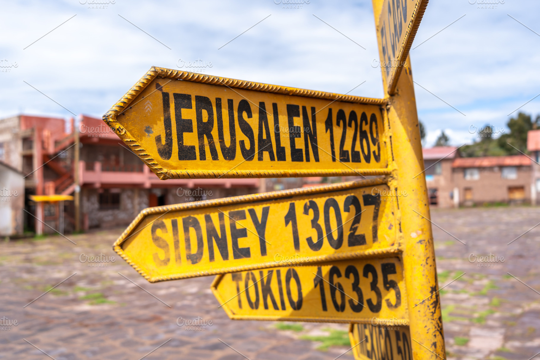 World capitals distance sign on Taquile Island, Lake Titicaca, P, a Photo by GoodGoods