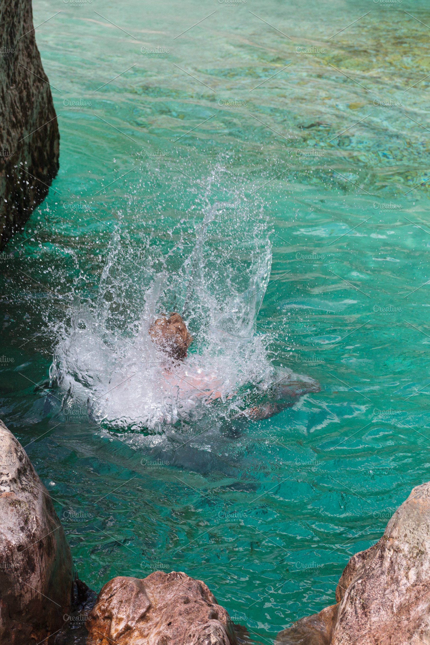 Woman diving into the Soca river, a Nature Photo by Bepslabor