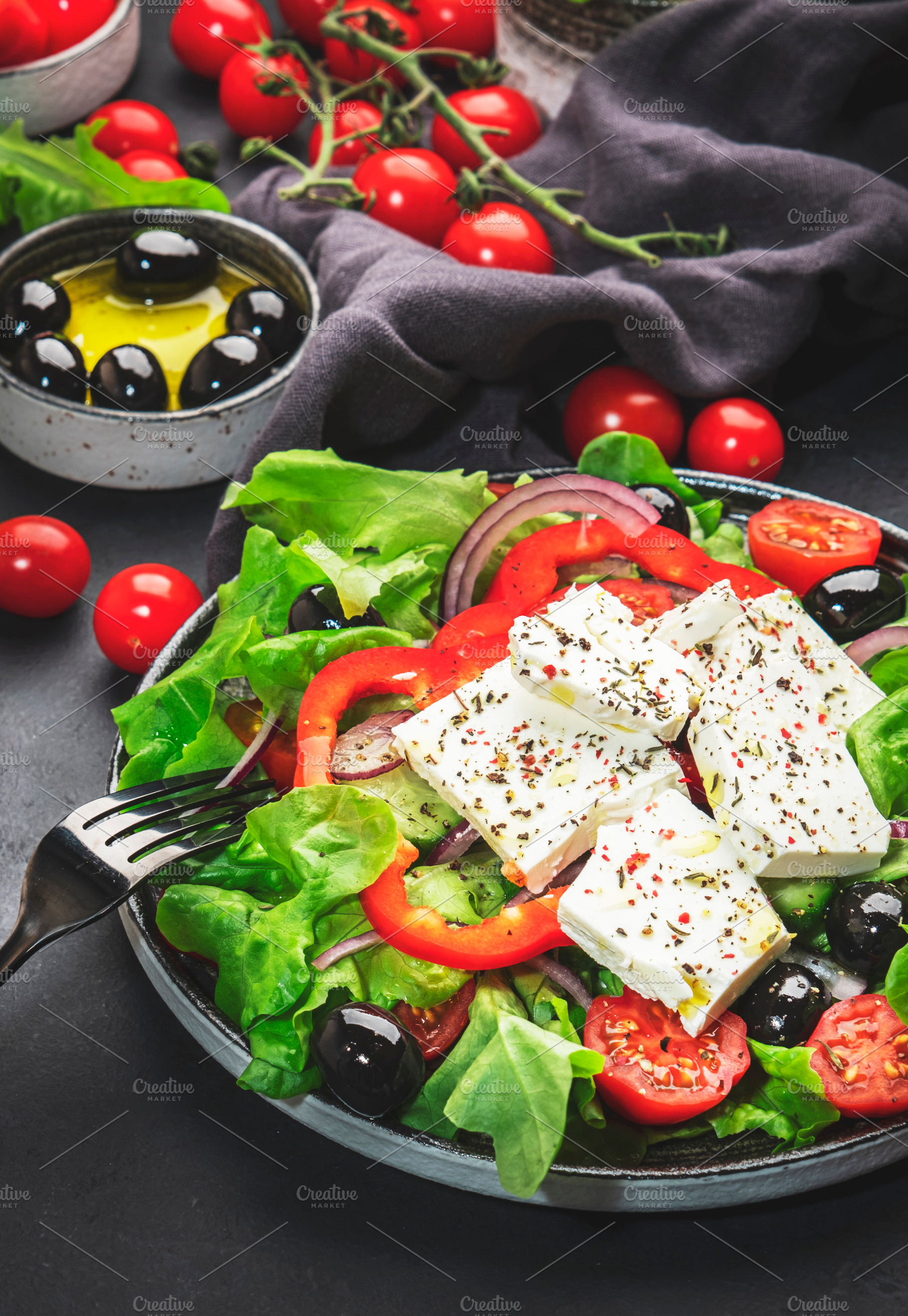 Vegetable greek salad with feta cheese, olives, tomatoes, paprik, a Food & Drink Photo by 5PH