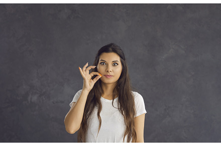 Portrait of young woman make gesture, a Person Photo by StudioRomantic