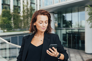 Middle-aged businesswoman, a Business Photo by Artem Varnitsin