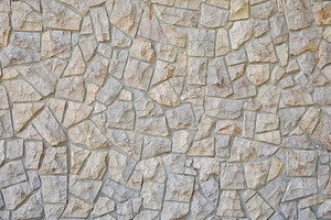 Wall with a pattern of decorative irregular gray stones, a Background Photo by Davizro's Market