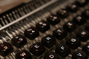 Vintage typewriter featuring typewriter, office, and analog