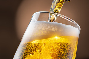 Jet of beer out of the bottle, a Food & Drink Photo by Volff