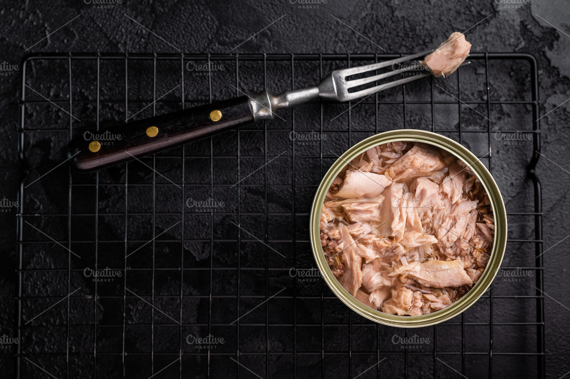 Convenient tinned tuna fillet, perfect for quick meals and packe, a Food & Drink Photo by composter-box@mail.ru