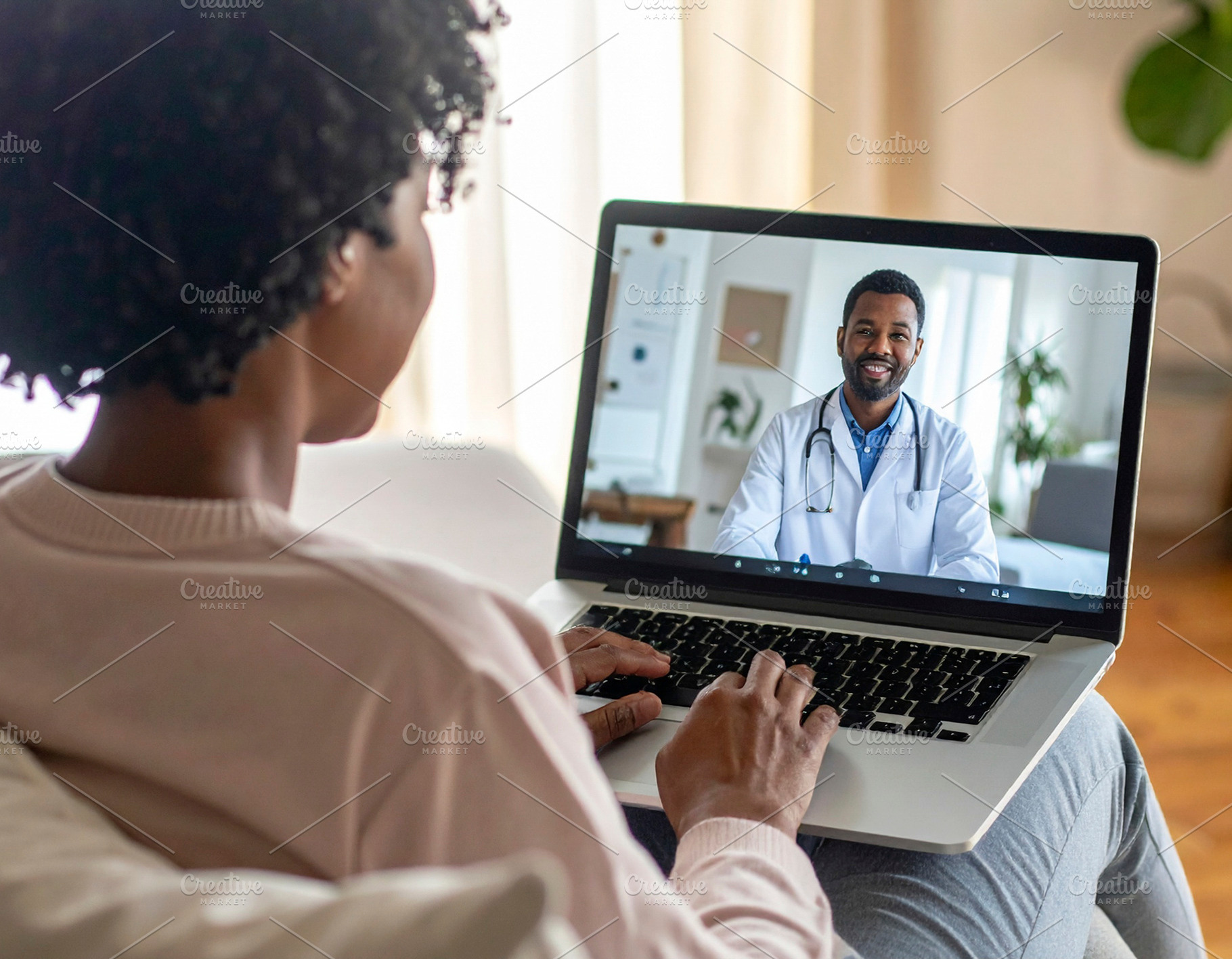 Woman atient at home using a laptop for a telemedicine consultat, a Health & Medical Photo by DanFLCreativo