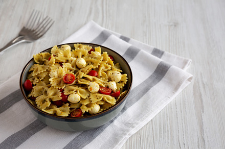 Homemade Pesto Pasta with Tomatoes ans Mozzarella in a Bowl, sid, a Food & Drink Photo by LiudmylaChuhunova