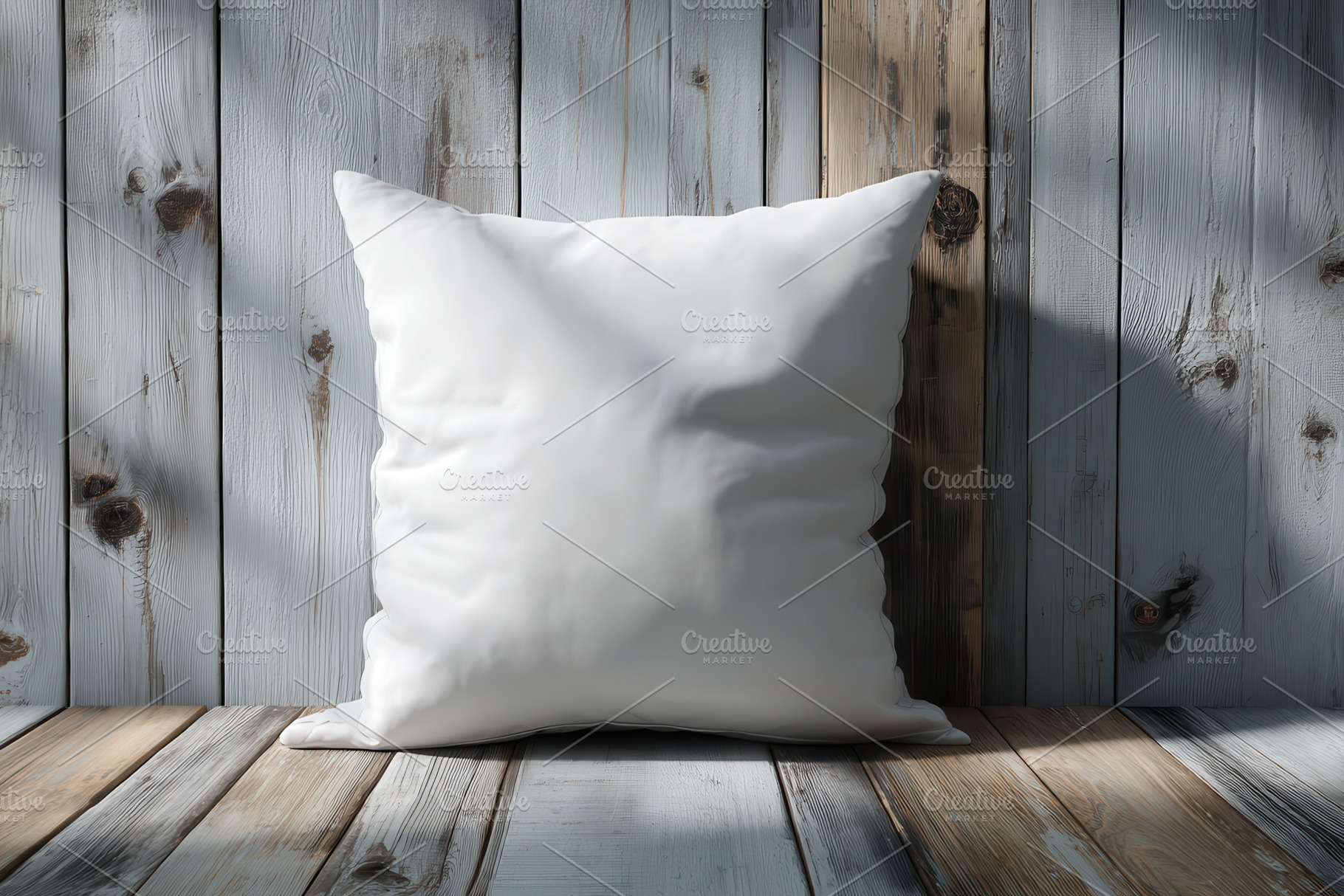 White pillow on rustic wooden floor, a Photo by Pixeness Studio