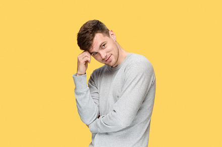 The young man smiling and looking at camera stock photo containing adult and, a Person Photo by Volodymyr Melnyk
