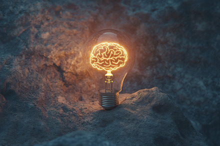 Glowing Brain Inside Lightbulb Symbolizing Creativity and Innova
