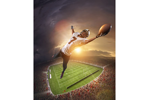 American football players catching