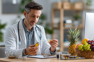 Doctor examining pills healthy lifes, a Photo by Pixeness Studio