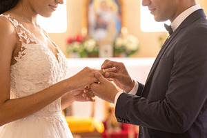 Bride and Groom Exchanging Rings in Church, a Person Photo by Davizro's Market