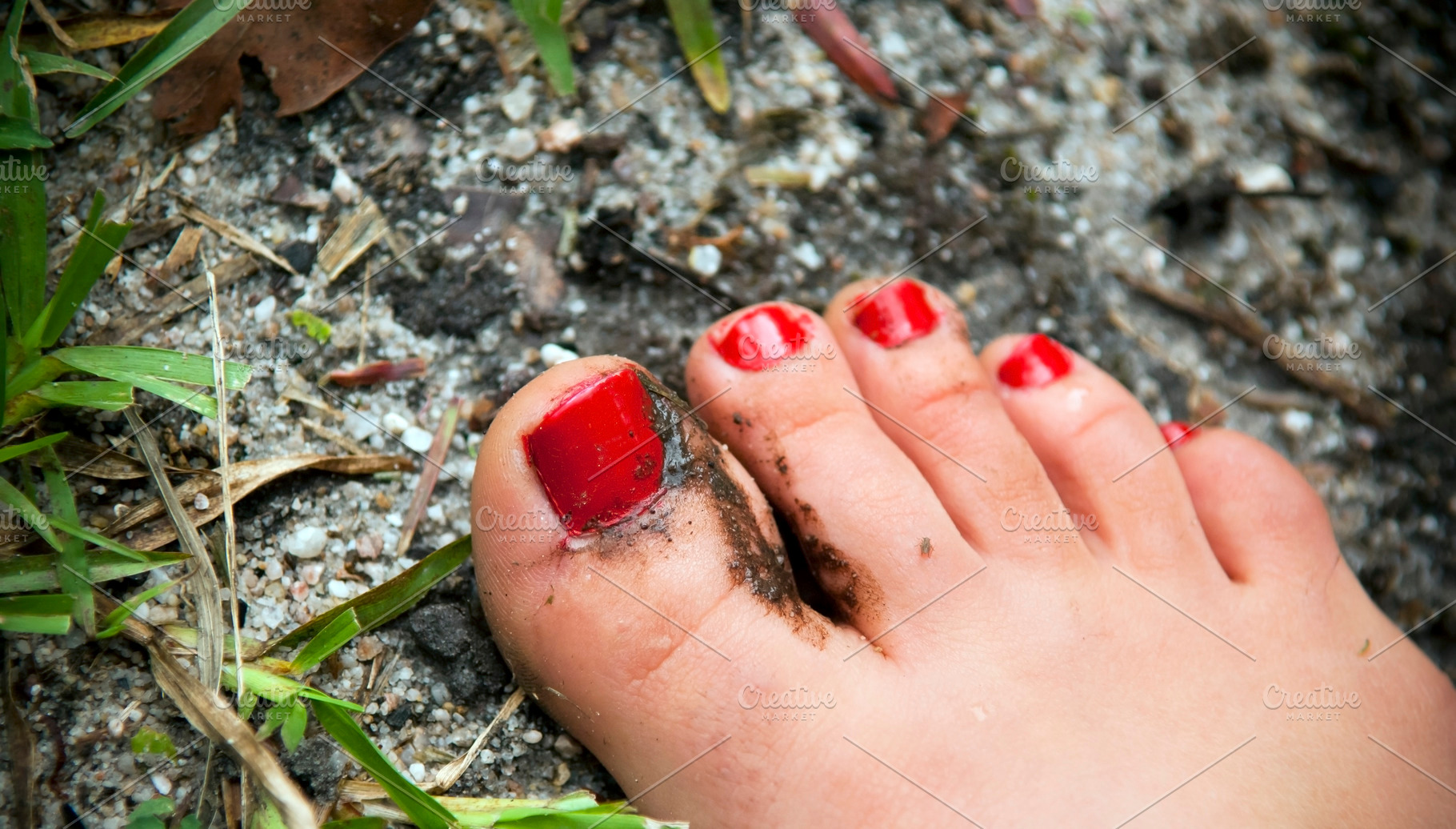 Painted Nails in Mud, a Person Photo by THP Creative