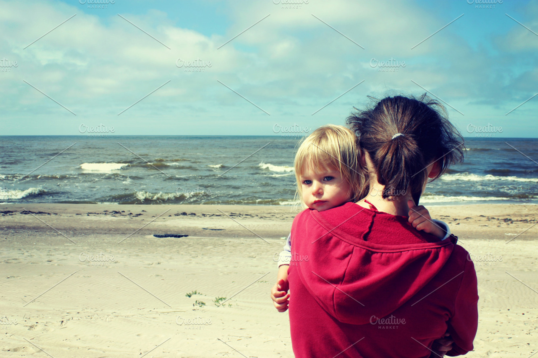Mother and daughter on the beach, a Person Photo by BOOCYS