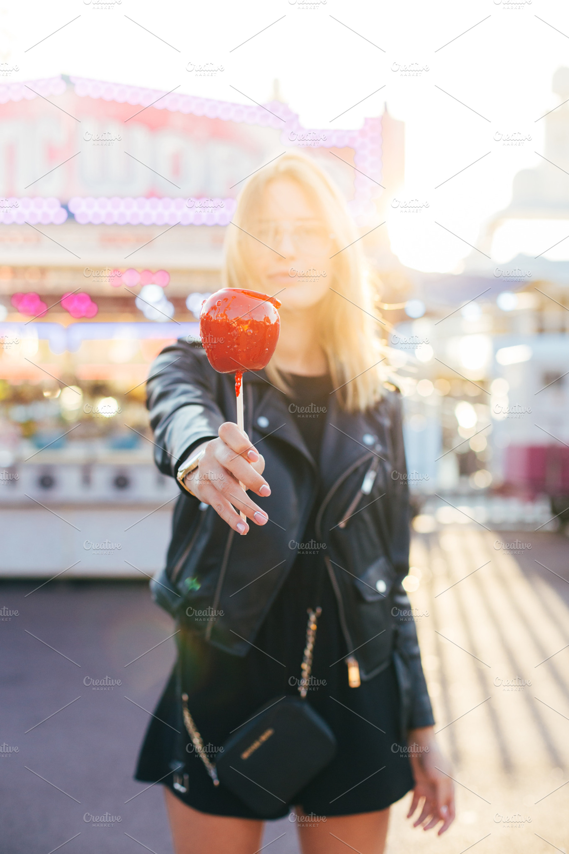 Woman at fair carnival w sugar apple containing girl, love, and food, a Food & Drink Photo by DeRepente