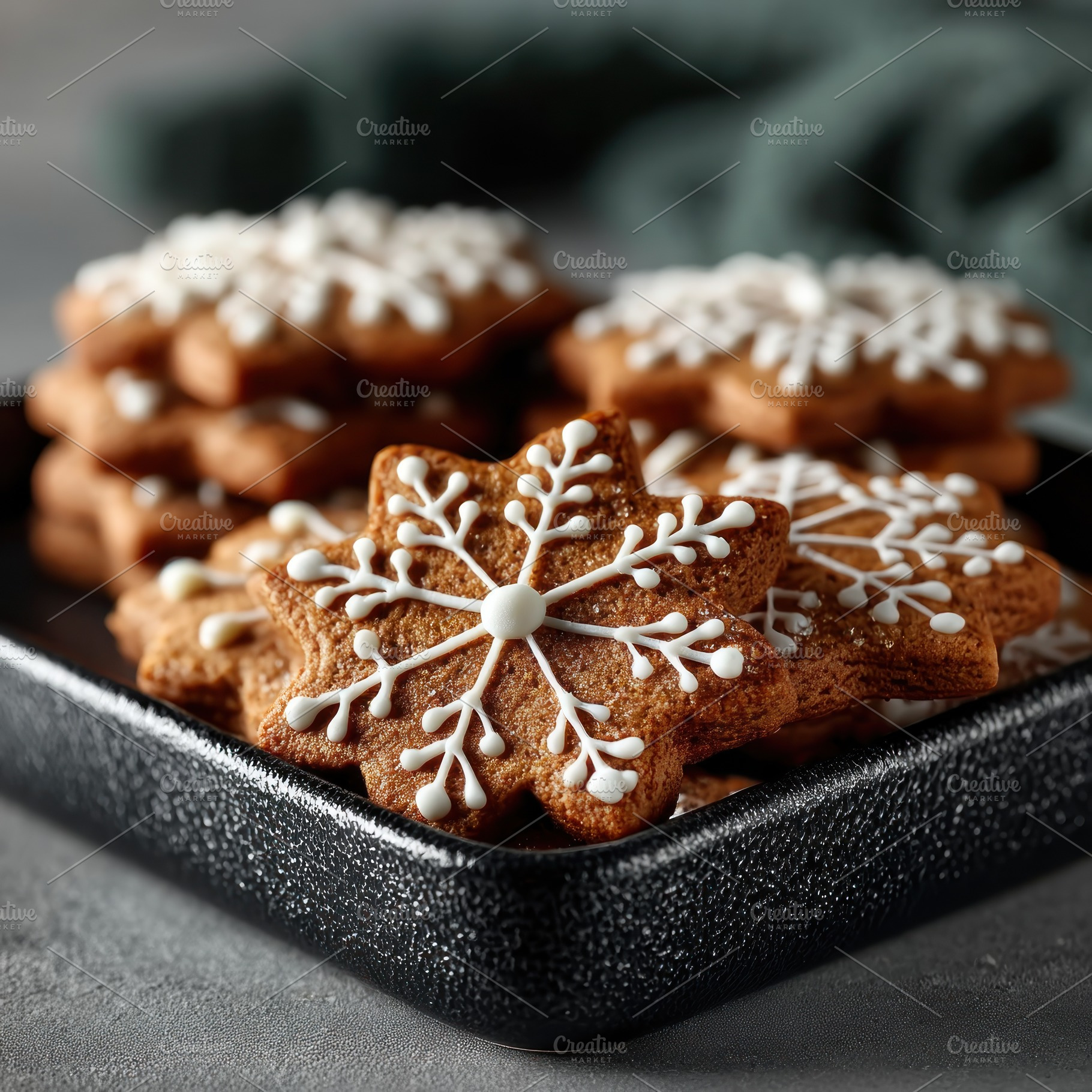 Snowflake shaped gingerbread cookies with white icing decoration, a Holiday Photo by José Manuel Gelpi